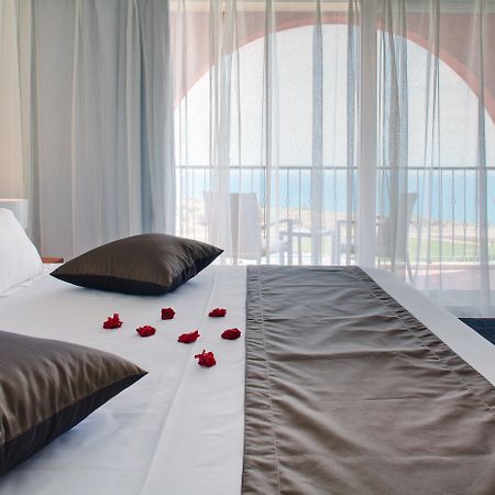 فندق لايتهاوس غولف وسبا بالشيك المظهر الخارجي الصورة A bedroom at the hotel